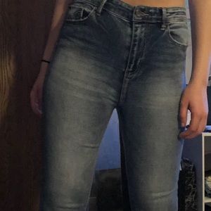 Medium wash high rise skinny jeans
